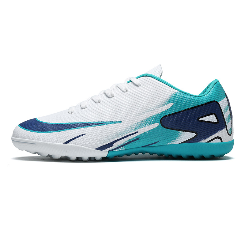 Nuevos zapatos de fútbol masculinos y femeninos transfronterizos nuevos clavos bajos AG clavos estudiantes jóvenes asesinos zapatos de fútbol spot