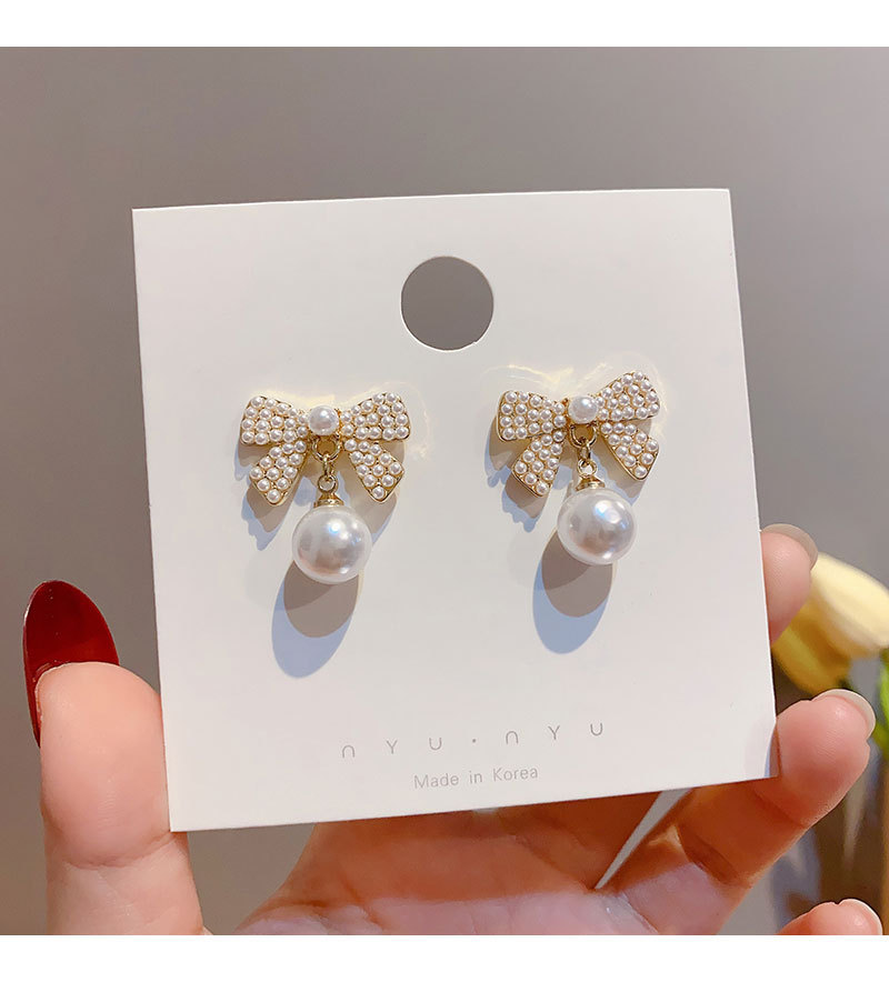 Korean Bow Pearl Earrings display picture 9
