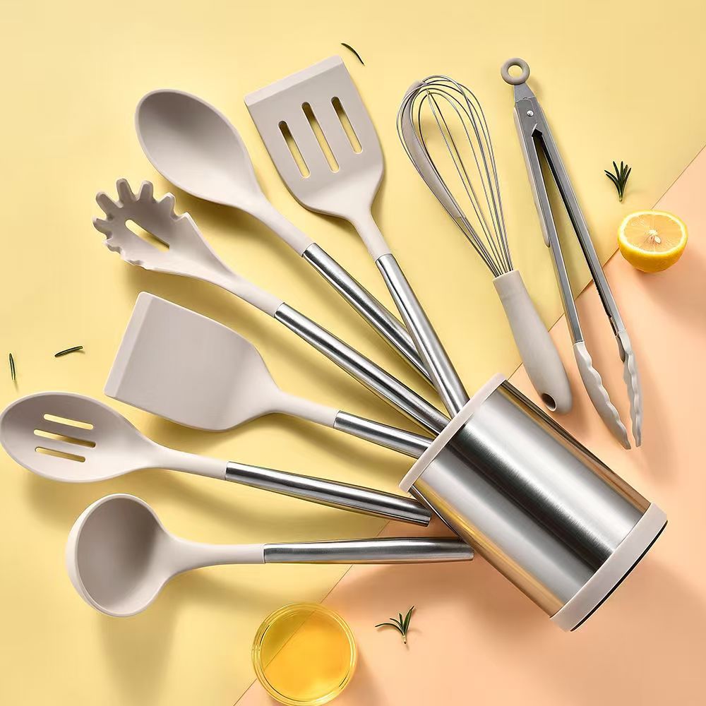 Comercio exterior venta caliente set de cocina de silicona 12 piezas set de silicona antiadherente set de barril de almacenamiento giratorio