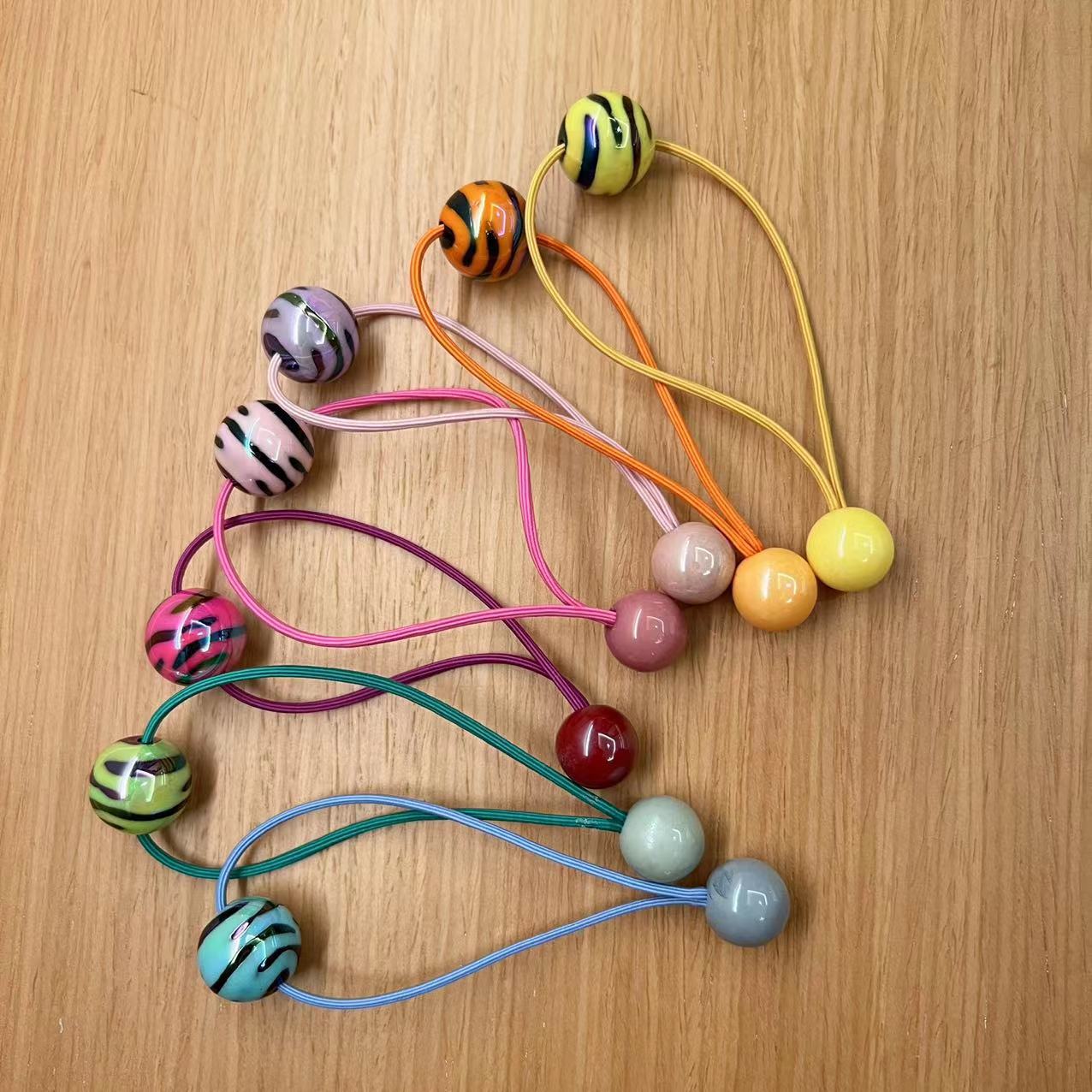 Yiwu venta al por mayor cuerda de pelo de doble cabeza para niños cuerda de pelo negro Yiwu agente de compra