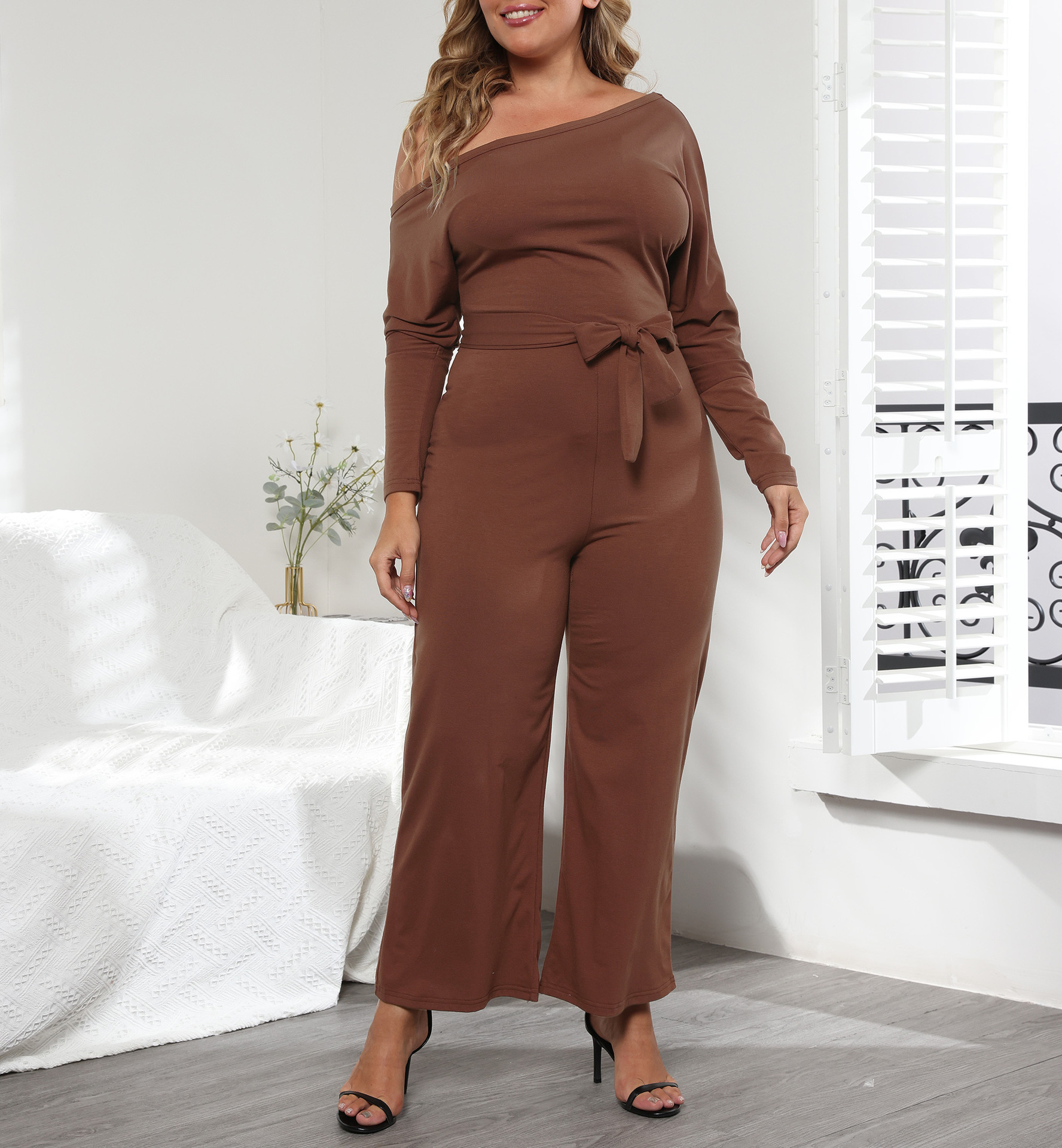 plus size irregular slanted shoulders long-sleeved lace-up solid color jumpsuits NSOY125576