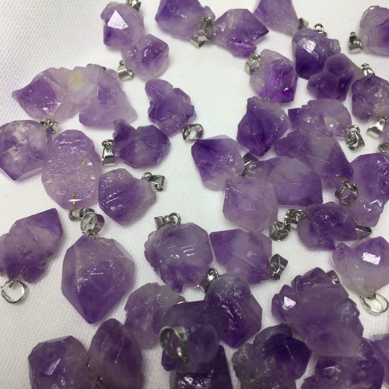 Purple crystal pendant with amethyst, natural ore