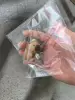Focus on touching the fish (OPP bag packaging and sending pieces)