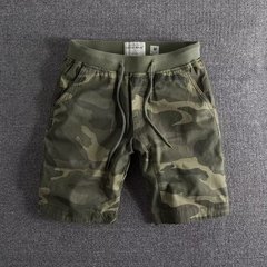 夏の新型迷彩半ズボン男性のファッションブランドのゆったりとしたカジュアルな5分のズボンの男性の運動服の中でズボンのビーチのズボン
