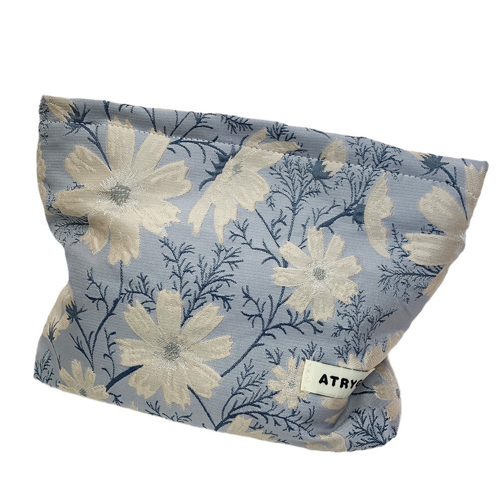 Bolsa de maquillaje una gran cantidad de flores Jacquard tejido Jacquard bolsa de almacenamiento de productos de cuidado de la piel de viaje bolsa de maquillaje portátil