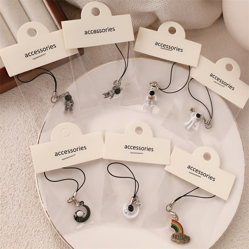 Cosmonautas lindos colgantes superman astronautas estelares móviles colgantes bolsos llaveros colgantes