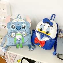 卡通蓝色怪兽时尚包包女日系创意个性高颜值背包外出旅行便携书包