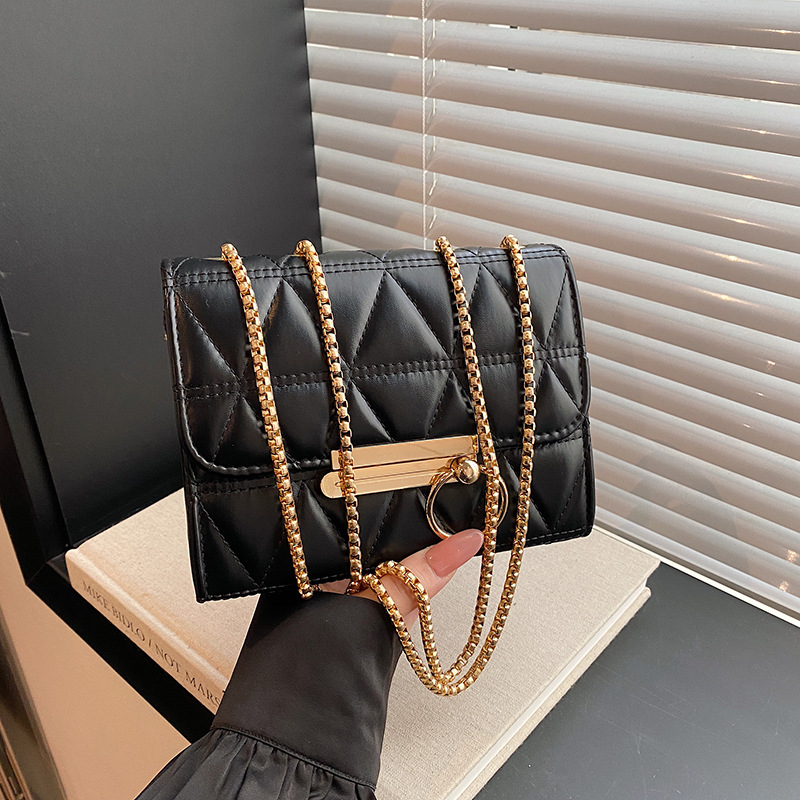 2024 invierno nuevo triángulo auto personalidad costura de cadena de color sólido bolso de moda de hombro sólido bolso de tramo inclinado