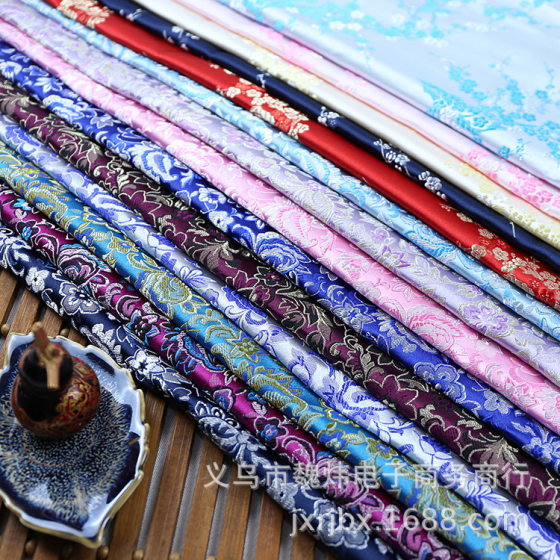High-grade brocade fabric silk satin ancient costume Chinese clothing COS clothing Tang suit cheongsam Fabric open mouth smile small flower
