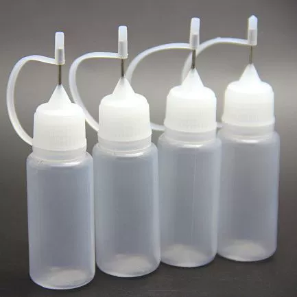 Bottle 5 ml & 10 ml, squeezable PE body with stainless steel pin tip and PP cap