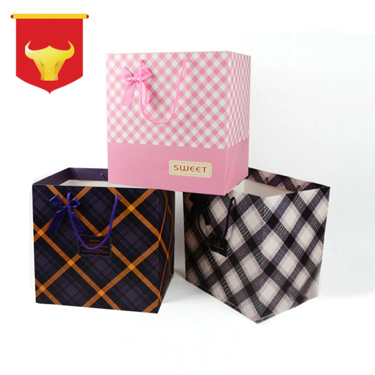 厂家定制儿童服装纸袋 粉色网格状礼品手提纸袋
