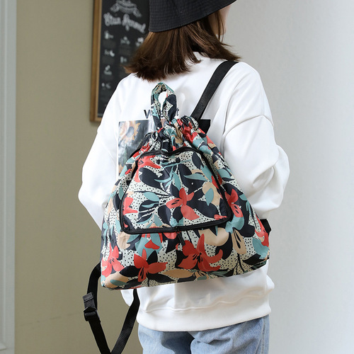 Wholesale women's bags  new drawstring backpack printed nylon cloth backpack foldable drawstring pocket floral cloth bag for women