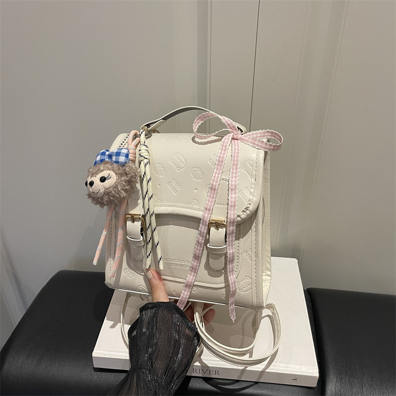 Mochila en relieve 2026 primavera y verano nueva moda mochila de viaje de mano bolso de cubo de hombro