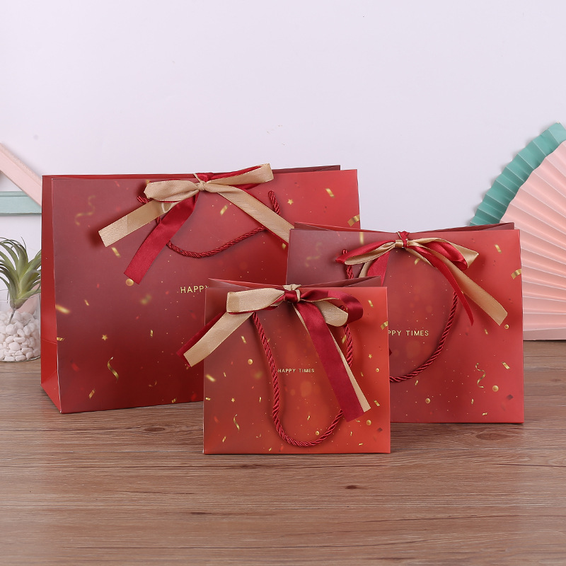 现货红色喜庆纸袋礼品袋过年春节礼物包装袋喜庆送礼丝带蝴蝶结