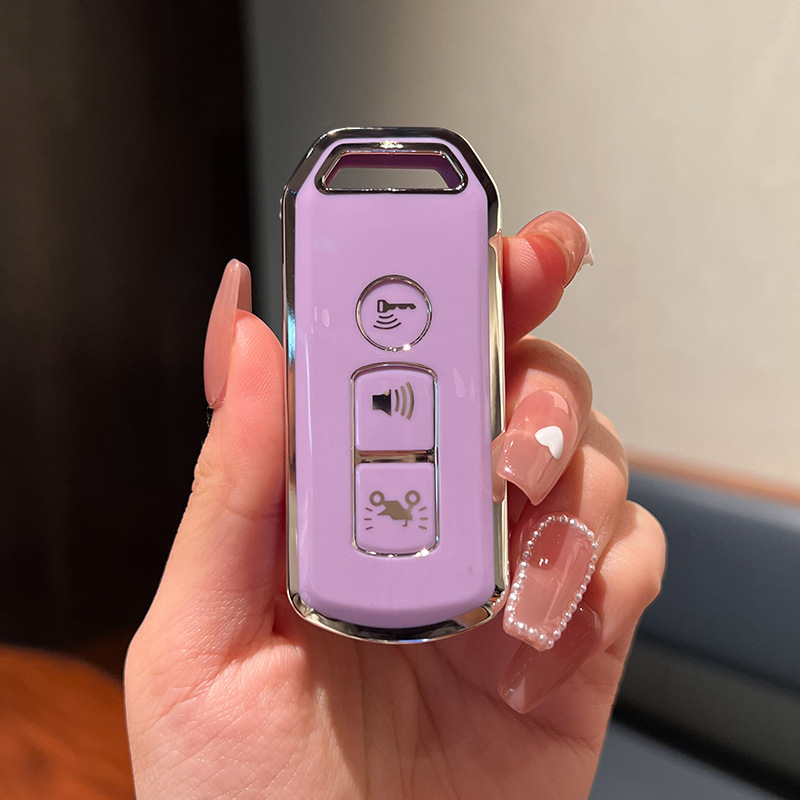 Imágenes aplicables Fosha 350 funda de llave de motocicleta agrietada 125 Xindazhou ns125la/PCX150 funda de hebilla