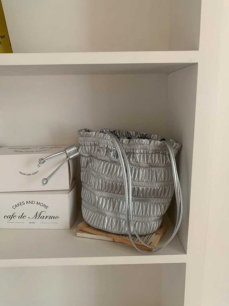 Korean INS niche design, gentle soft leather pleated drawstring bucket bag, one shoulder fashionable texture, silver_voghion.com