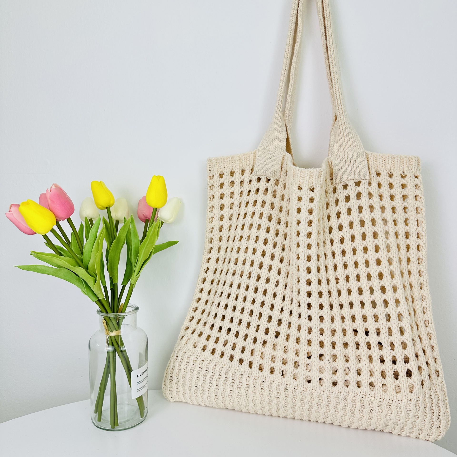 2023 nueva bolsa transfronteriza bolso de mano japonés y coreano bolsa de color sólido bolsa de punto bolsa hueca bolsa de hombro bolsa tejida