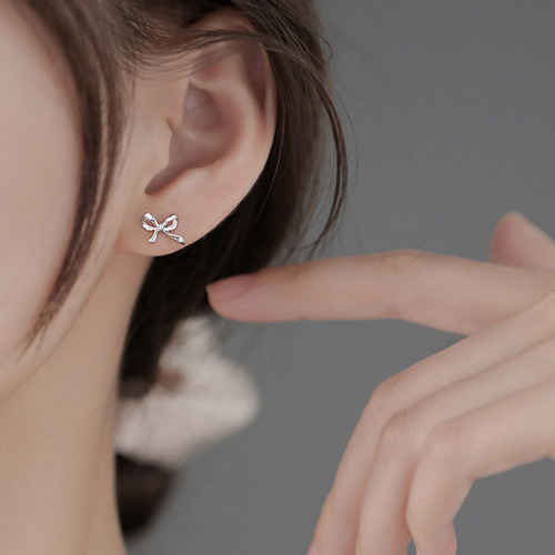 Bow tie earrings for women  trendy simple cold style internet celebrity niche design hollow earrings