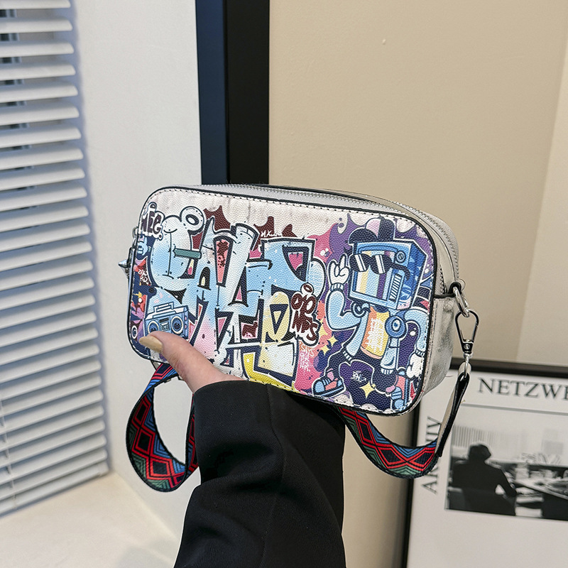 Bolso cuadrado pequeño estilo explosivo transfronterizo, graffiti de personalidad femenina, bolso puenting, bolso de cámara con correa de hombro ancha de moda, bolso de mensajero de hombro de todo fósforo