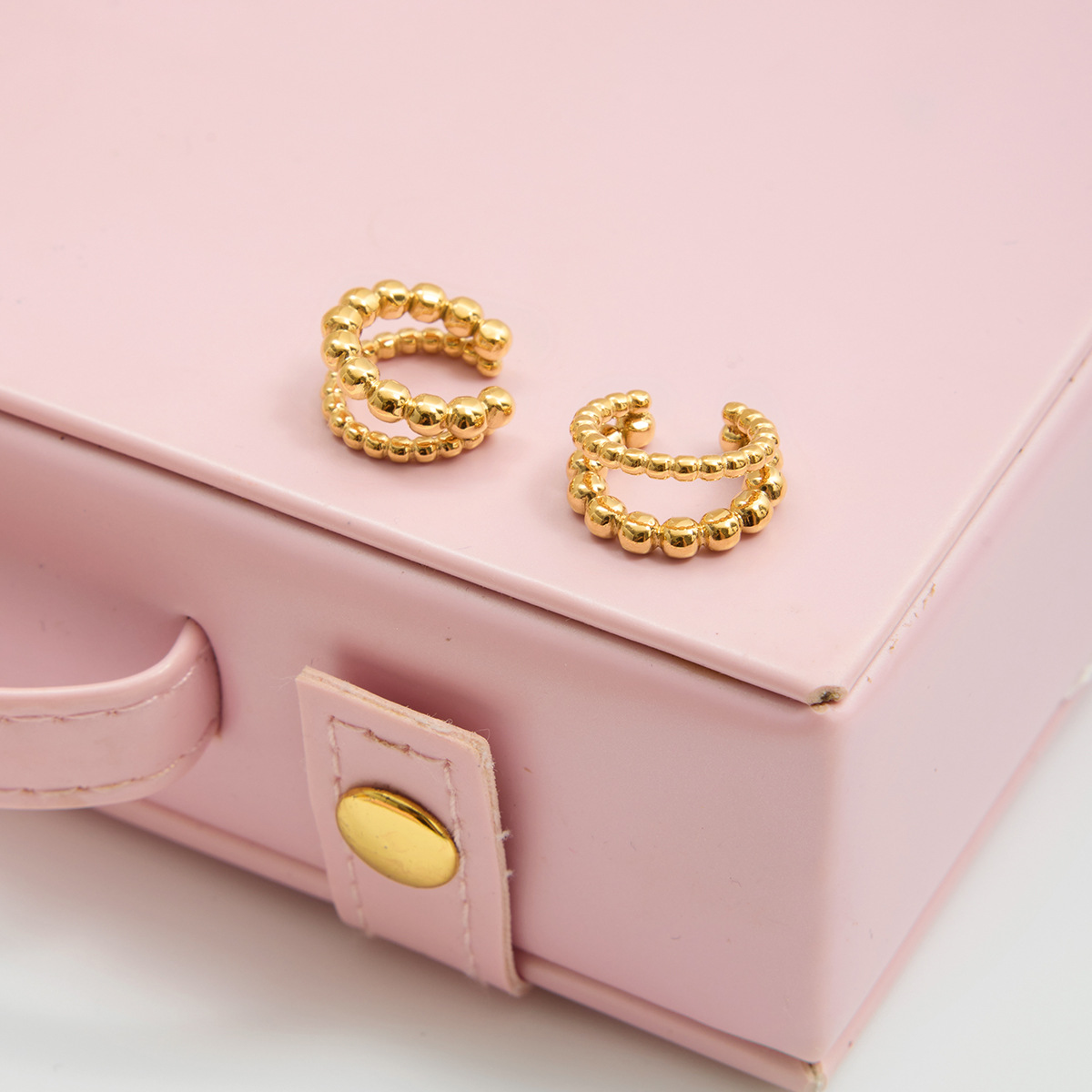 Wanxing Europa y los Estados Unidos sin agujeros de orejas de orejas de bolas de doble capa de orejas de oro 18 quilates personalidad de moda pendientes de cabello