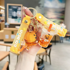 クリスタルキーホルダーハロウィンカボチャパーティーオイル流砂フローティング人形ペンダント車のスクールバッグバッグ卸売
