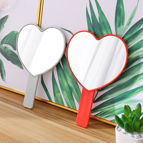 Heart-shaped mirror wholesale Korean version portable love handle mirror makeup hand-held mirror cute small mirror hand-held portable mirror