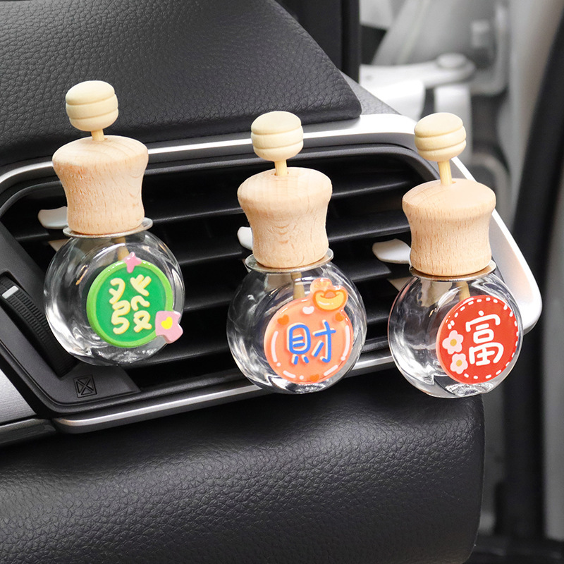 Clip de aromaterapia de coche, texto auspicioso, botella vacía, botella volátil, decoración de salida de aire de coche, fragancia de coche linda de dibujos animados