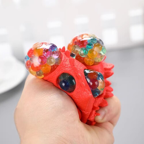 Creative hand-squeezing dinosaur to vent and decompress toy, pinch and play, trick to decompress and exploding grape ball, vent ball small toy