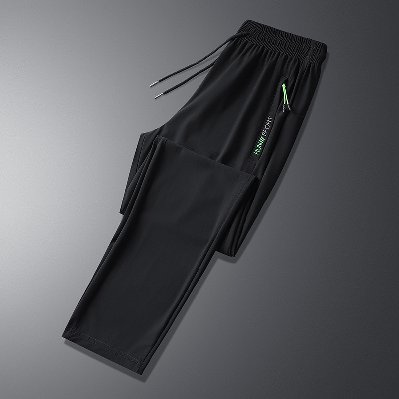 Pantalones deportivos casuales de seda de hielo para hombres pantalones de verano finos de punto de oro elásticos de secado rápido casuales atados al tobillo más pantalones de tamaño