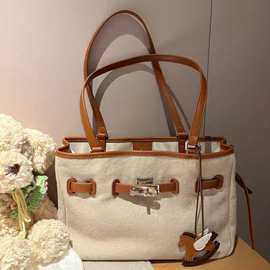 南枫新款百搭向日书店托特包包女款大容量手提包通勤单肩包斜挎包