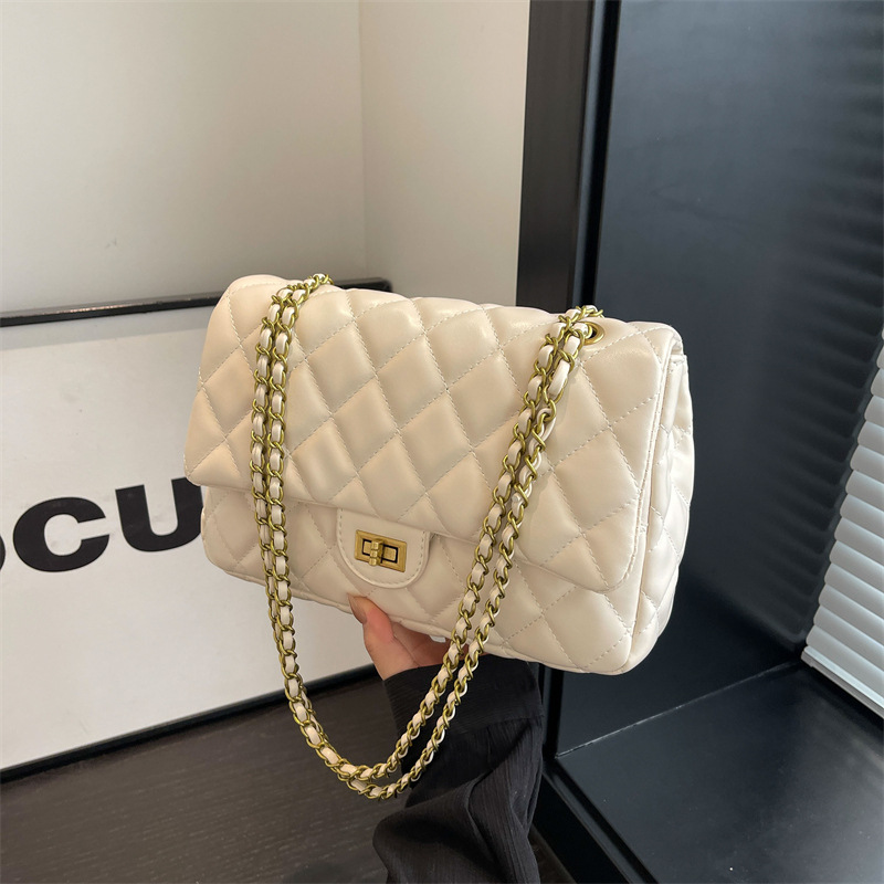 Sentido avanzado xiaoxiangfeng lingge Chain 2024 nuevos bolsos de color sólido mujeres soft Fashion 100 bolsos de hombro y axila