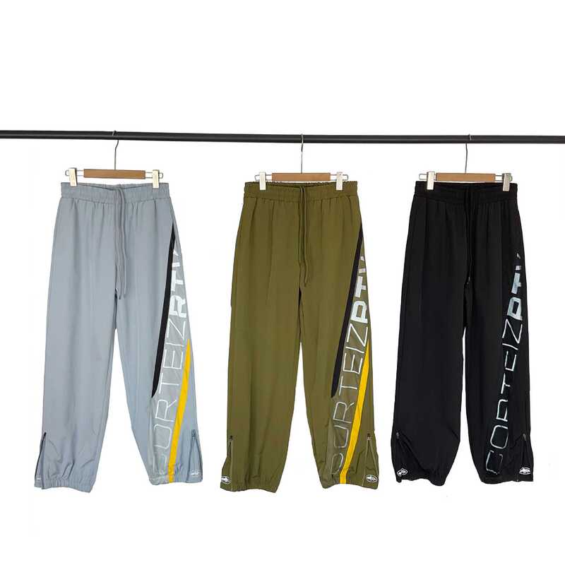 26 Cross-Border European and American Trendy Brand Alcatraz Reflective Letter Patchwork Stand Collar Windbreaker Jacket for Men and Women, High Street Reflective Trousers 26 Cross-Border European and American Trendy Brand Alcatraz Reflective Letter Patchwork Stand Collar Windbreaker Jacket for Men and Women, High Street Reflective Trousers