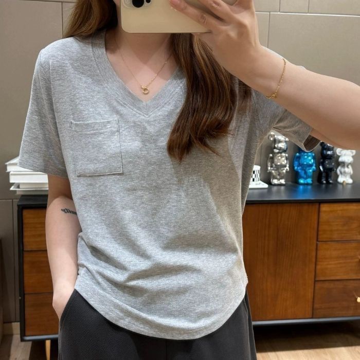 Camiseta de cuello en V de manga corta de gran tamaño para mujeres de verano nuevo diseño nicho coreano delgado bolsillo irregular blusa suelta image 4
