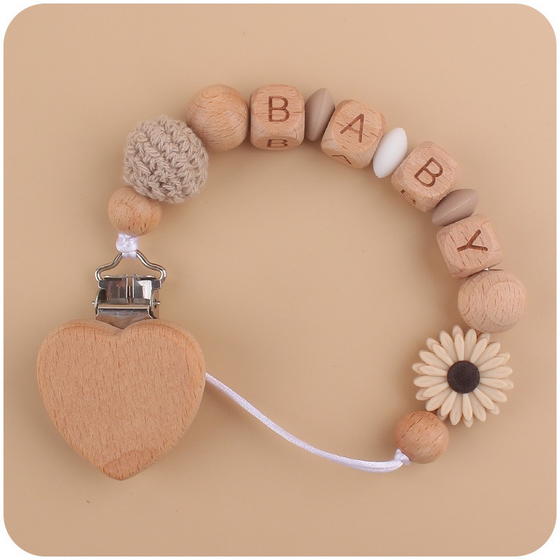Nuevo bebé haya melocotón corazón calmante bebé DIY dibujos animados Margarita cuentas de silicona mordedura pezón cadena