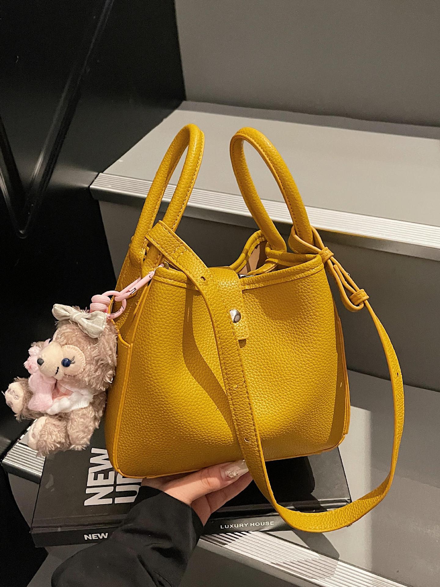 Venta caliente de comercio exterior bolso de cubo de verano mujer 2025 bolso de canasta de verduras de mano nueva tendencia bolso de mensajero de alta gama de todos los partidos