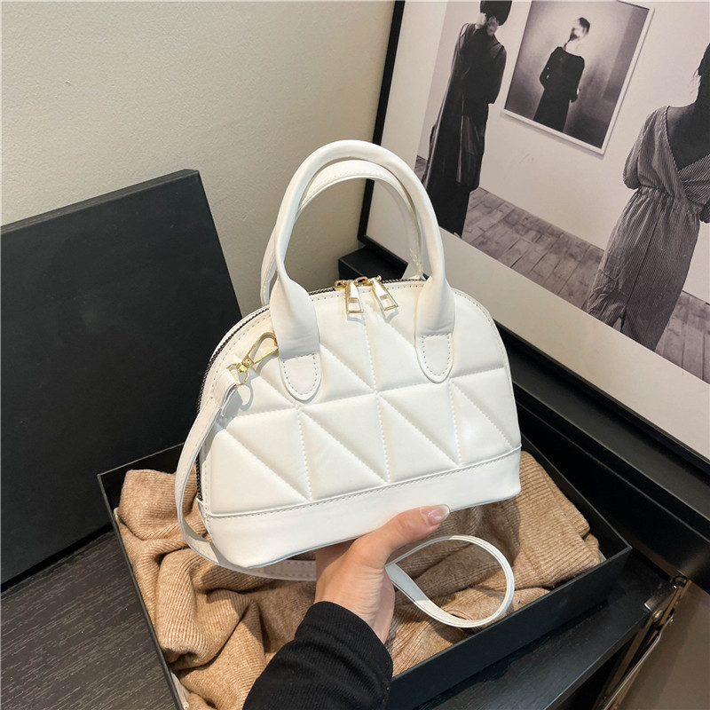 Bolso de hombro popular de este año Bolso de mano en relieve de hilo bordado de moda 2025 primavera nuevo bolso de mensajero de moda bolso femenino