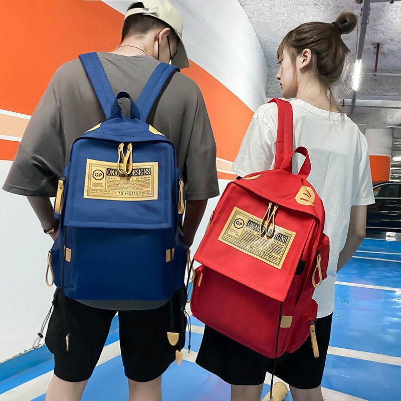 Korean version of female middle school students backpack wholesale backpack male plus LOGO large capacity travel bag business computer backpack