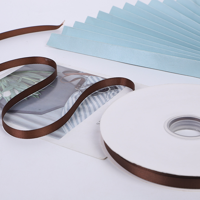 Suministro directo de fábrica cinta roscada cinta marrón caja de regalo embalaje bolso cinta accesorios de ropa cinta al por mayor