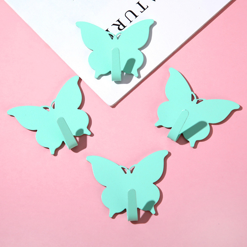 Gancho de mariposa fuerte sin agujeros ins viento encantador gancho adhesivo de corazón de niña decoración de pared de habitación gancho adhesivo de alto valor visual