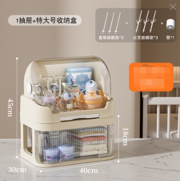 赤ちゃんの哺乳瓶を入れて箱に入れます。赤ちゃんの食器と箸を入れます。