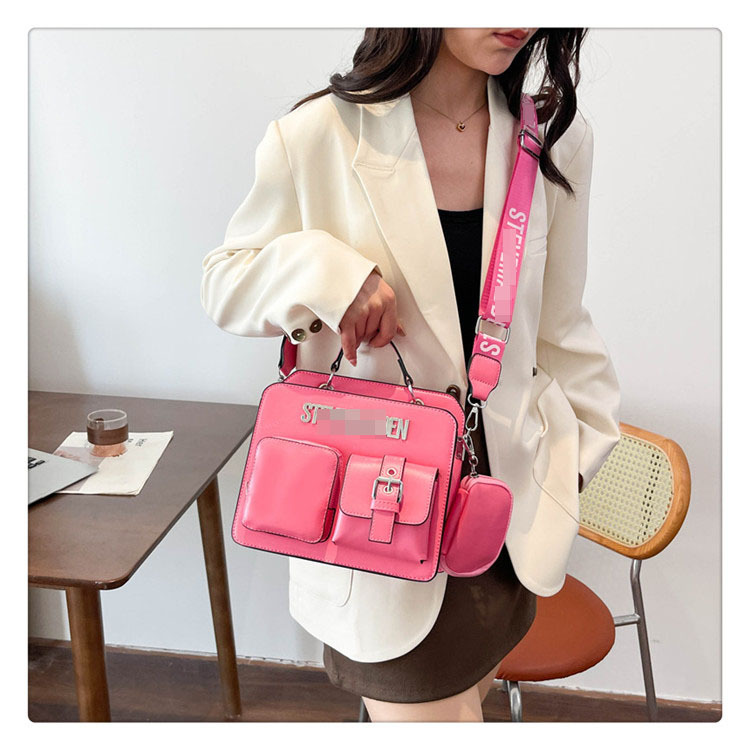 Bolso de moda de estilo europeo y americano 2025 primavera nuevo estilo simple y atmosférico bolso de letras cinturón de hombro ancho bolso de mensajero de un solo hombro