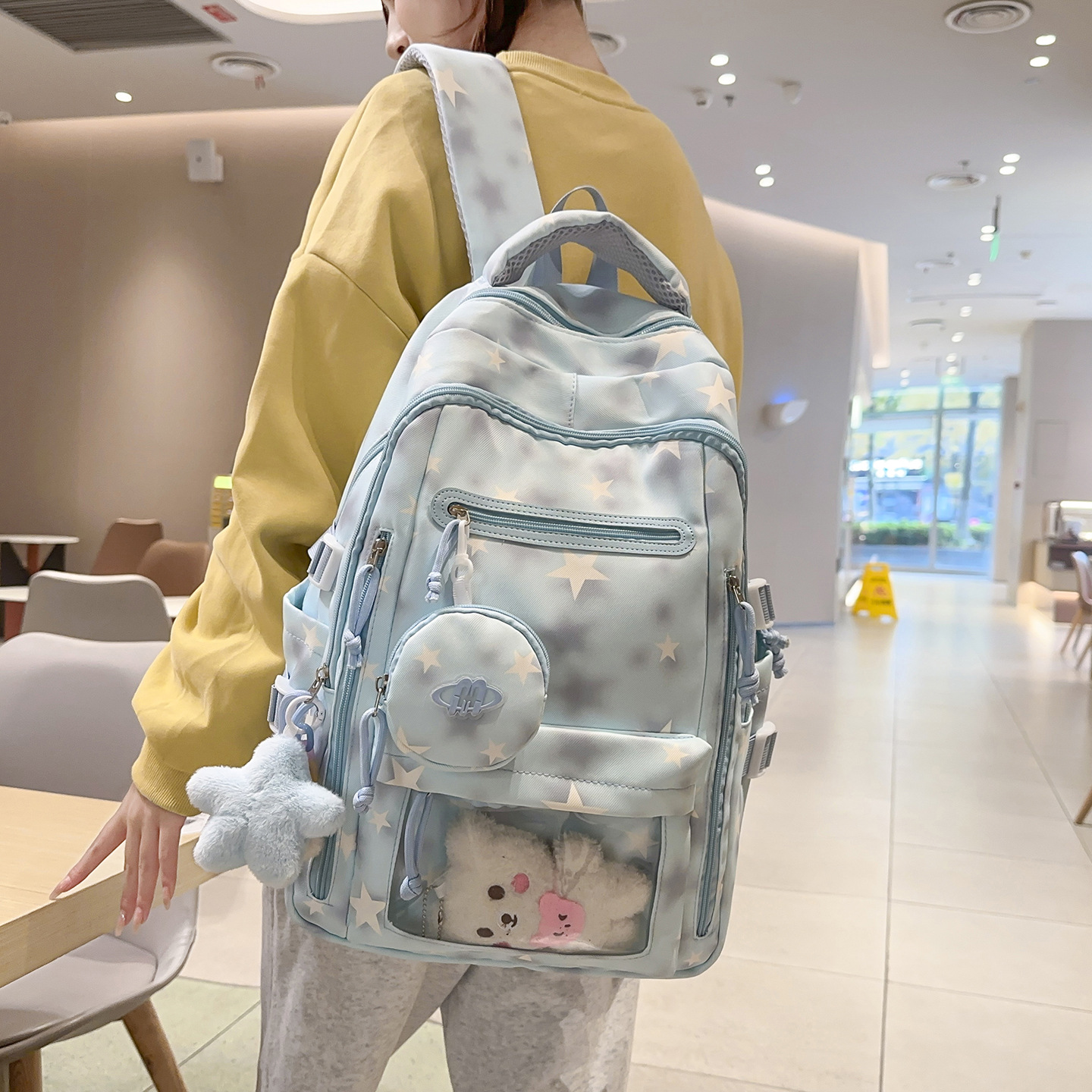 New Breathable, Weight-Reducing, Spine-Protecting Junior High School Backpack for Female Students in Grades Three to Six, Large-Capacity Student Bag, Star Backpack