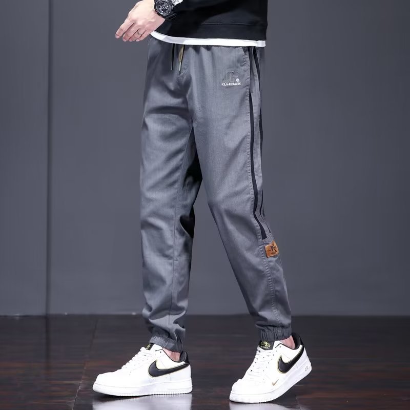 Pantalones casuales, pantalones vaqueros sueltos de talla grande para hombres, pantalones largos Harlan juveniles de todo fósforo a rayas, marca de moda perezosa