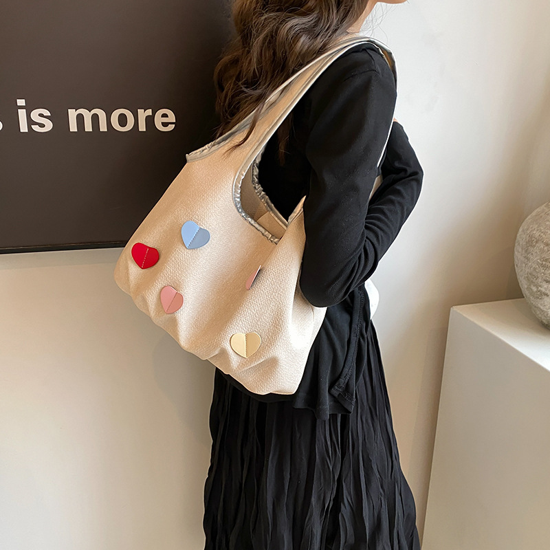 Bolsas de lienzo de nicho coreano para mujeres verano 2024 nueva moda bolsas de bolsa casuales, bolsas de brazo de la niña dulce