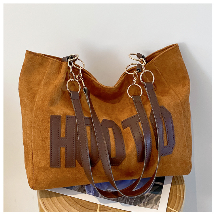 Bolso de lona de hombro único para estudiantes universitarios, bolso grande para mujeres, gran capacidad, nuevo modelo de primavera 2025, bolso tote para viajes.