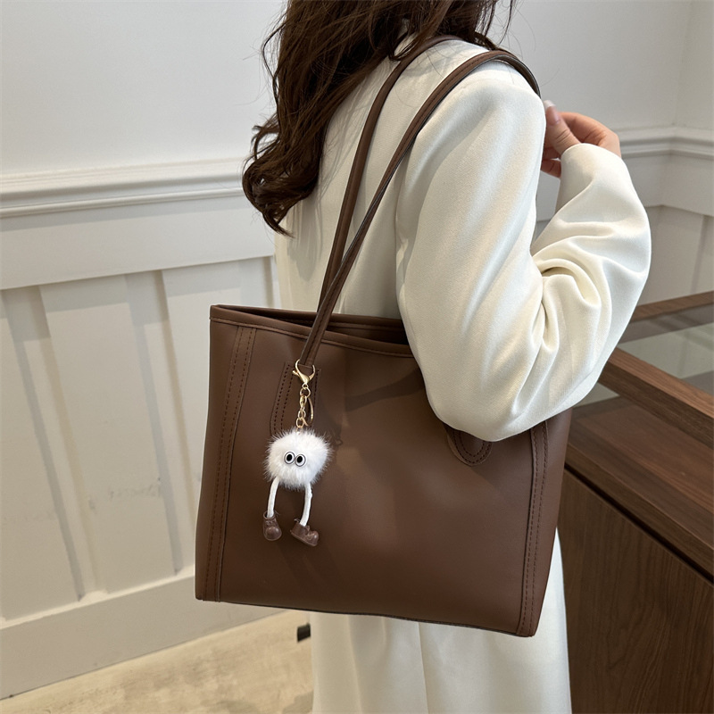 Bolsa axillar de gran capacidad para mujeres 2024 nueva moda otoño invierno sensación de bolso de hombro para estudiantes casuales bolso de clase