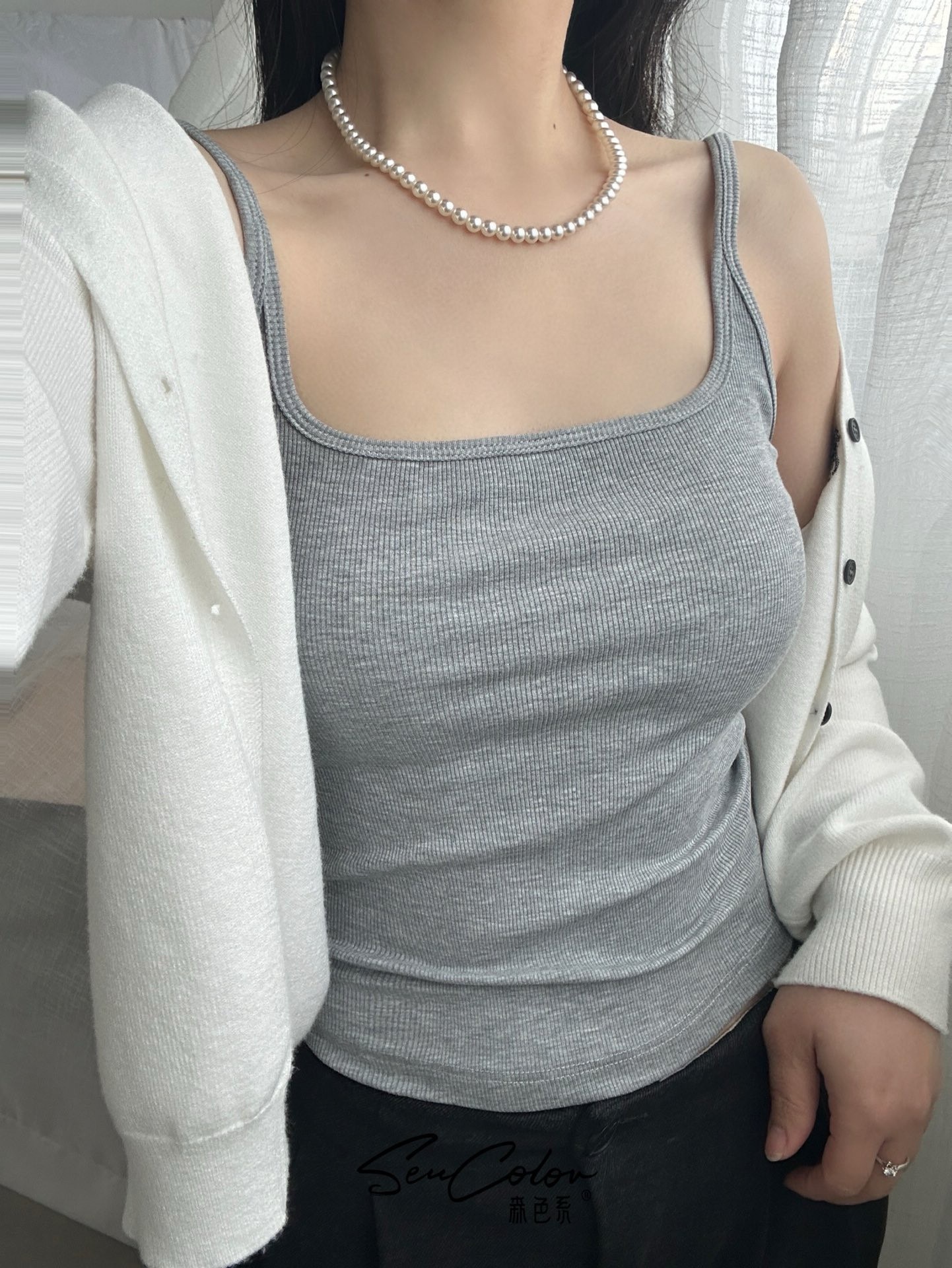 Verano nuevo estilo de moda hilo de bambú algodón fija taza chaleco de cabina simple y cómodo para la piel cabina antibacteriana mujer