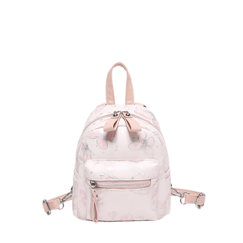 Mochila japonesa fresca para damas dulce flor impresión de aire extranjero mochila pequeña 2025 nuevo mini bolso