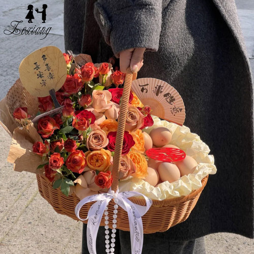 Postpartum gift set with eggs, fruits, and a flower basket featuring handmade woven floral hand-held basket and rattan basket for DIY flower arrangement