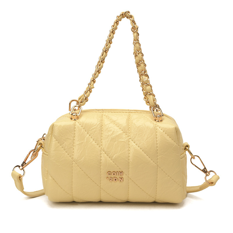 Bolsa de estilo de viaje de cadena de diamante para mujeres 2026 nueva sensación diaria de estilo extranjero bolso de hombro otro medio